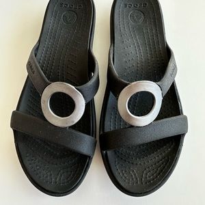 Black w/silver accent crocs sandals size 6 VG condition made of croslite